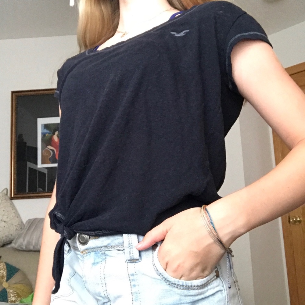 Shirt with knot at the bottom